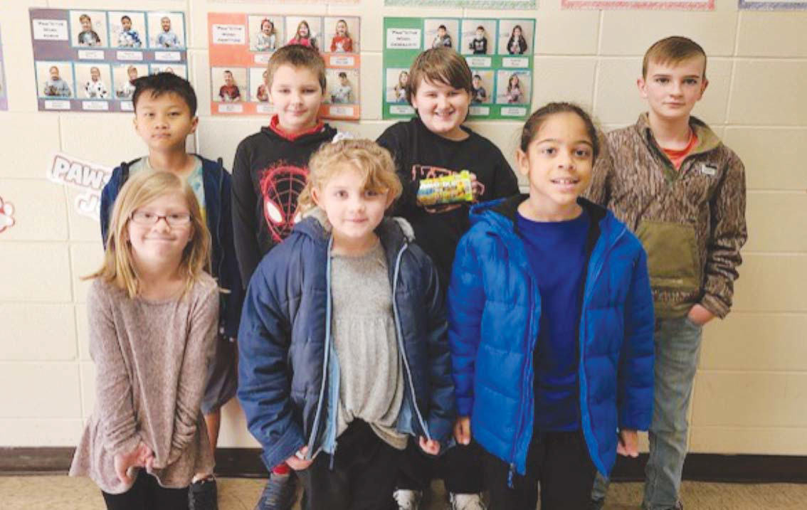 WES JANUARY STUDENTS OF THE MONTH - These Woodlawn Elementary students exhibited "Dedication", which was the January 'Paw'sitive word of the month. Pictured are Front Row: Isabella Abrams (Kindergarten), Monroe Chastain (First Grade), Zion Purifoy (Second Grade); Back Row: Raymond Cung (Third Grade), Scottlee Squires (Fourth Grade), Brawner Dively (Fifth Grade), and Brennan Burke (Sixth Grade).