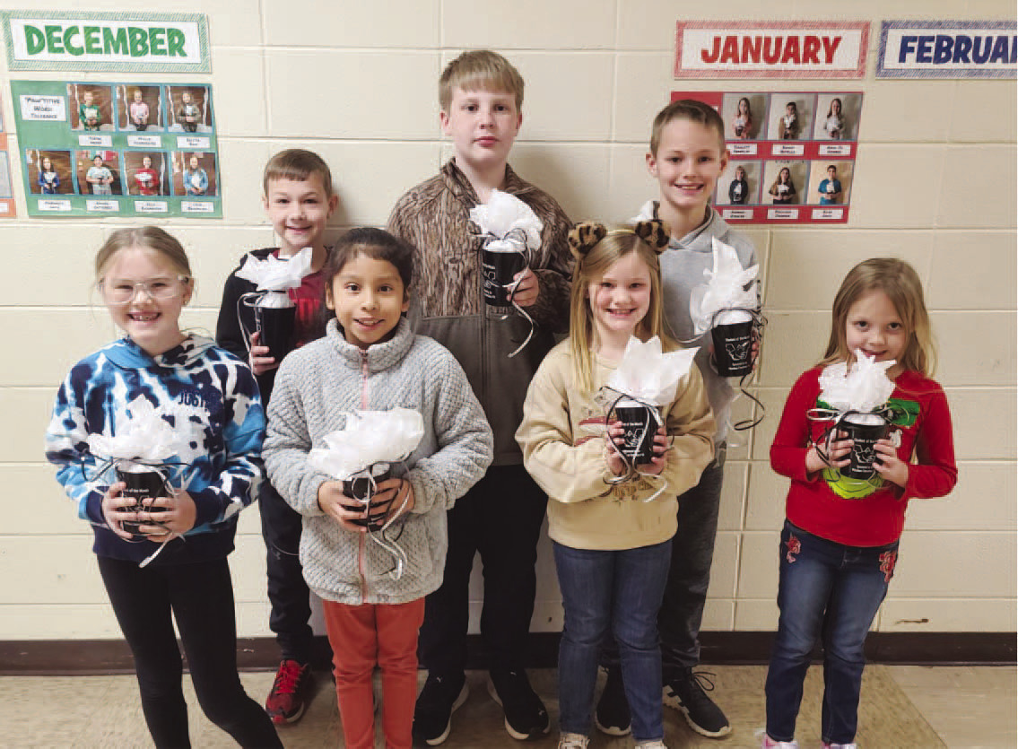 WOODLAWN ELEMENTARY FEBRUARY STUDENTS OF THE MONTH - These students consistently exhibited good behavior and were nominated by their homeroom teacher. Back Row: Ryler Shell (4th grade), Bentley Parker (6th grade), Jack Reed (5th grade); Front Row: Landree S ullivan (3rd grade), Anayeli Duran (2nd grade), Bellamy Reed (1st grade), Annika Knight (Kindergarten).