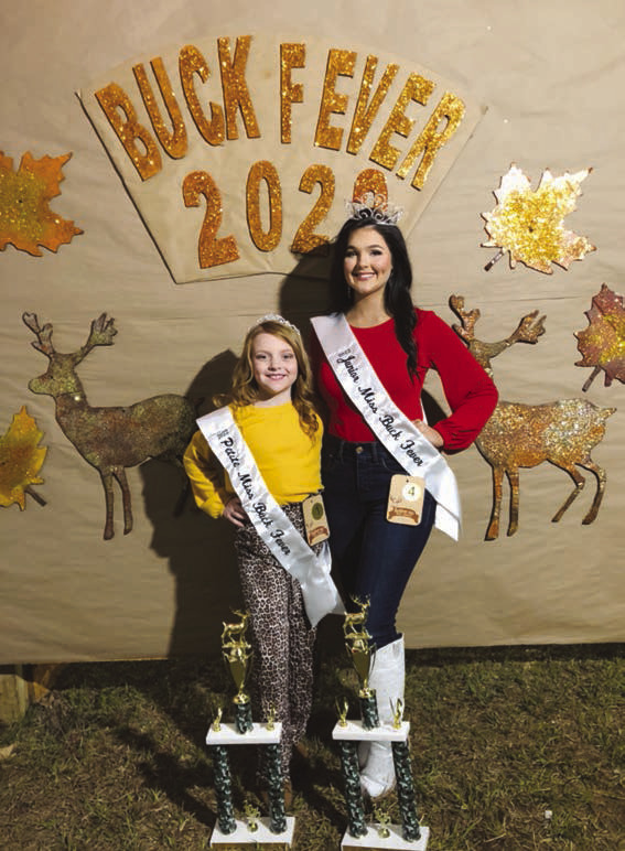 Two from Cleveland County earned titles at the Buck Fever Festival held Nov. 12 in Banks. Gracen White, 15, (right) is the daughter of Derek and Hayley White, and is in the 10th grade at Rison High School. She was crowned Junior Miss Buck Fever. Josie Miller, 9, (left) is the daughter of Justin and Joye Miller, and a member of the Classical Conversations Homeschool Program. She was crowned Miss Petite Buck Fever.