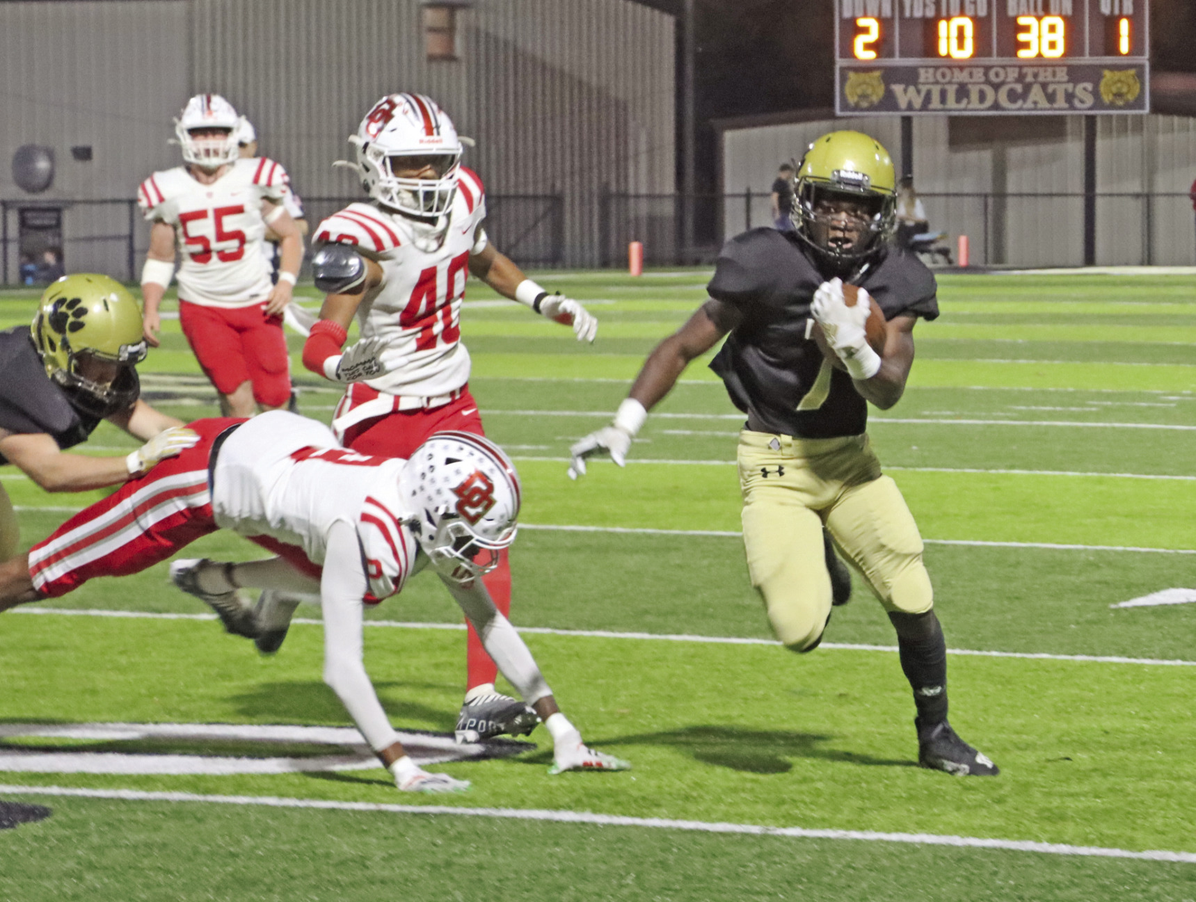 KINES TURNS THE CORNER - Rison running back DJ Kines (right, no. 7) finds the edge on the Drew Central defense to race 38 yards for the Wildcats’ first touchdown of the game. Kines finished with 165 yards rushing on 13 carries while fellow senior running back Bradyn Dupuy had 88 yards on 17 attempts, putting both over the 1,000yard rushing mark in final game of the regular season. (Photo by Chris Phillips)