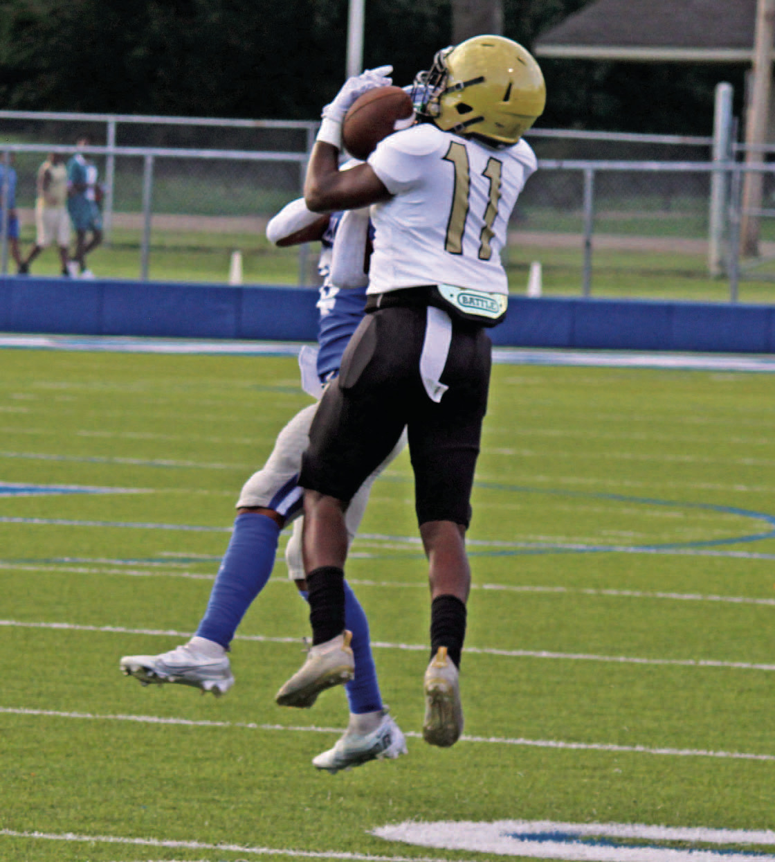 BIG SCRIMMAGE FOR WALKER - Rison junior Za'Kyler Walker wrestles the ball away from a Monticello defender before turning upfield for a 69yard gain on the Wildcat's first pass reception of the scrimmage. Walker had four catches for 124 yards.