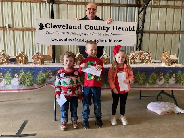 GINGERBREAD HOUSE CONTEST AGES 5 AND UNDER - The top three finishers in the The Call of Cleveland County’s Gingerbread House Contest sponsored by the Cleveland County Herald were (left to right) first place, Kye Grubb, age 3; second place, Lorelai Webb, age 3; and third place, Jett Grubb, age 4.