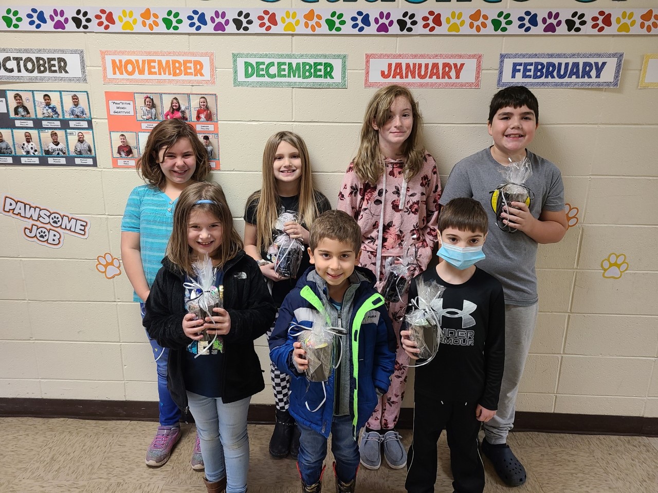 WES DECEMBER STUDENTS OF THE MONTH - These students exhibited "Generosity," which was the December 'Paw'sitive word of the month. Pictured are front row: Paisley Place (2nd grade), Matias Phillips (Kindergarten), Maverick Brainard (1st grade); back row: Allison Garrison (4th grade), Grayson Reed (3rd grade), Adalyn Puthoff (6th grade), Riley Davis (5th grade).