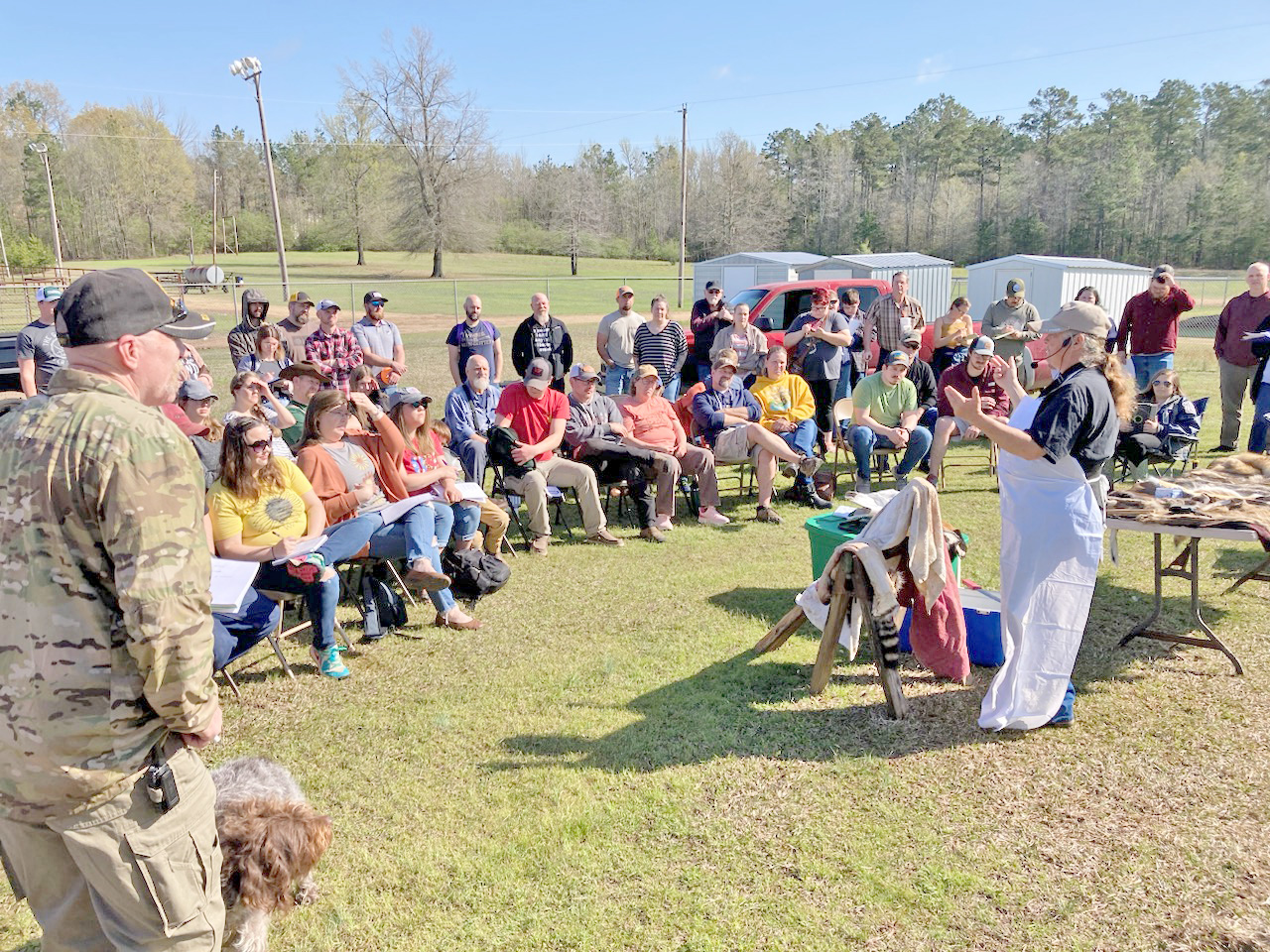 TANNING HIDES - Shona Jordan of Pike County prepares to demonstrate how to prepare a coon hide for tanning during one of the sessions at the Arkansas Homesteading Conference held Saturday at the Cleveland County Fairgrounds in Rison. More than 300 people from across the state took in the conference that offered educational sessions on wide variety of topics related to homesteading like gardening, herbal remedies, hydroponics, canning and more.