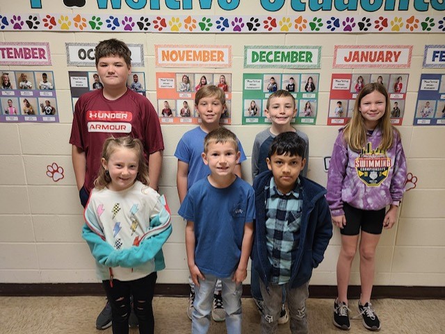 WOODLAWN ELEMENTARY STUDENTS OF THE MONTH - These students exhibited “Excellence,” which was the March ‘Paw’sitive word of the month. Pictured are Back Row: Logan Doss (6th grade), Eli White (5th grade), Carson Fothergill (3rd grade), Ella Burris (4th grade); Front Row: Heidi Long (Kindergarten), Remington VanDuren (1st grade), Giovanny Ruiz (2nd grade).