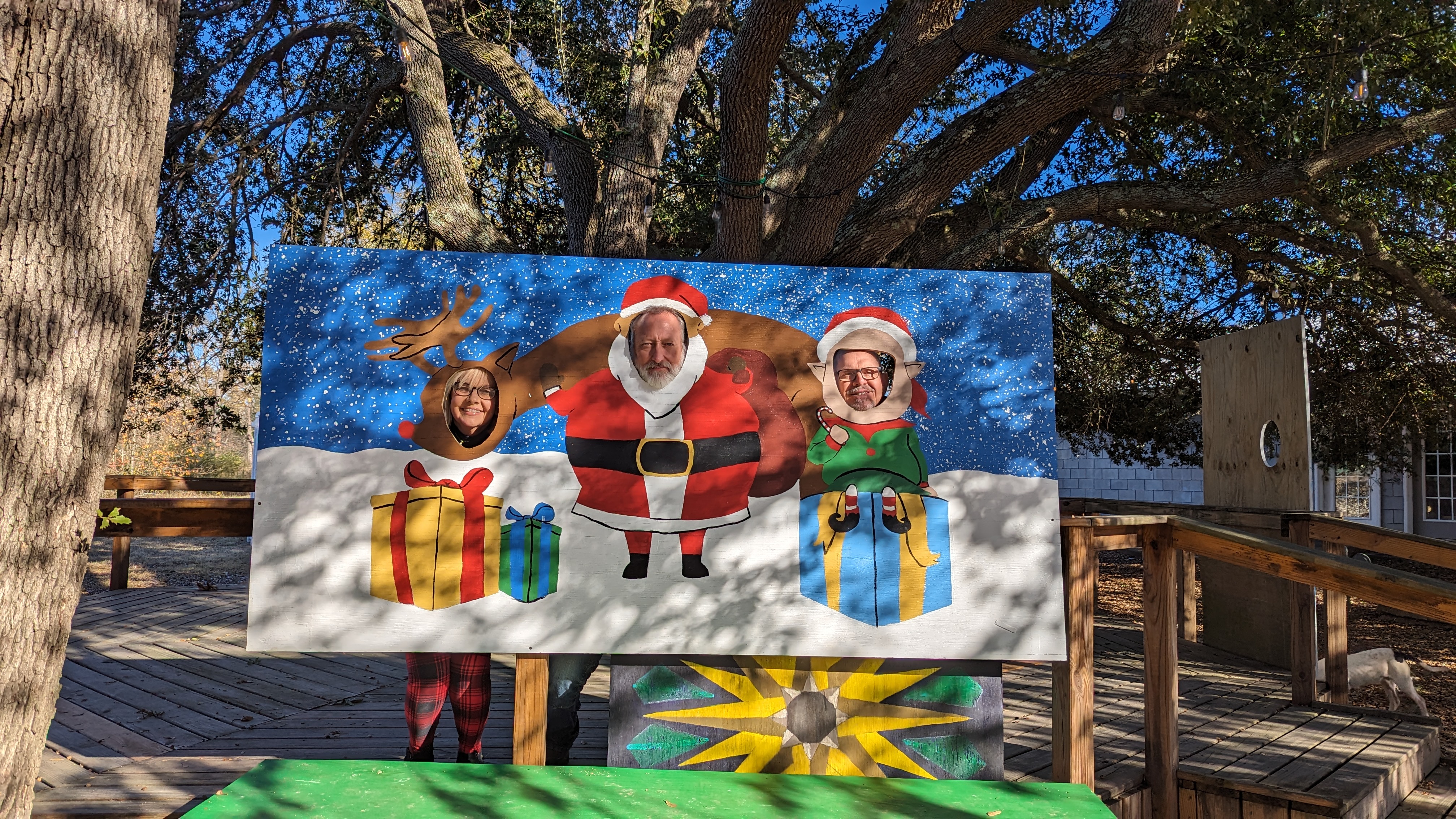 PARK PHOTO OPS - Pictured are Connie Roberts as Rudolph, Joe Freyer as Santa Claus and Mayor Charles Roberts as Santa's Elf.
