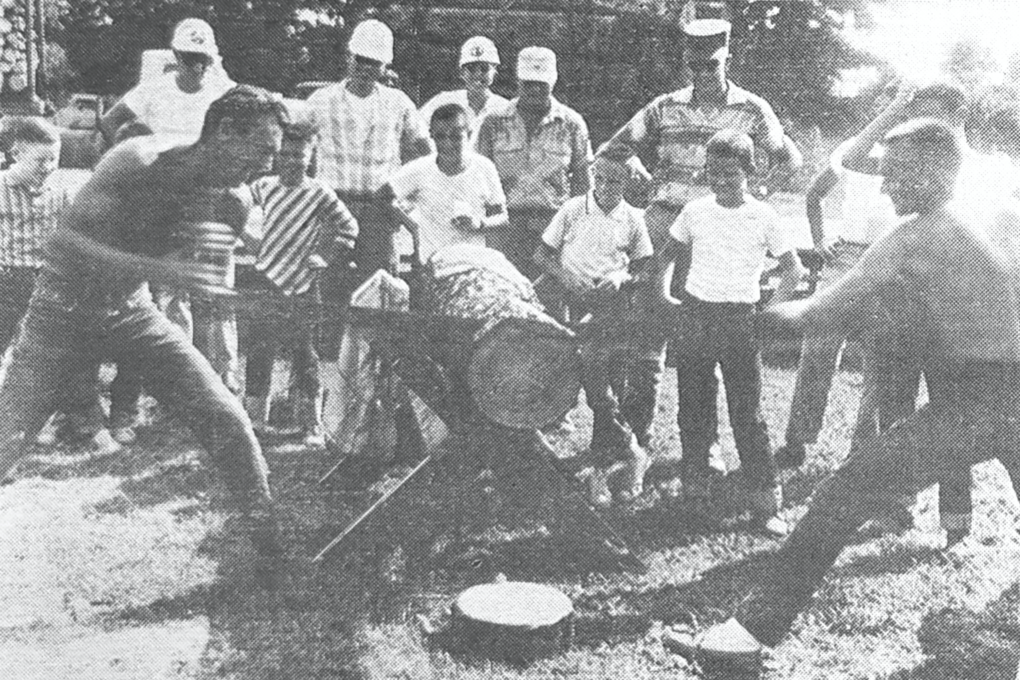 GLIMPSES  FROM  THE  PAST - For our last look back this month at Cleveland County fairs from the past, we go to the 1962 event in which there was a forestry activity conducted that included a log sawing contest. These two International Paper Co. employees, David Hale, left, and John Reed, right, make the sawdust fly in giving a sawing demonstration as part of the activity. The pair cut through the log in about 37 seconds. For questions or comments, contact Stan Sadler at sadler.stan@yahoo.com