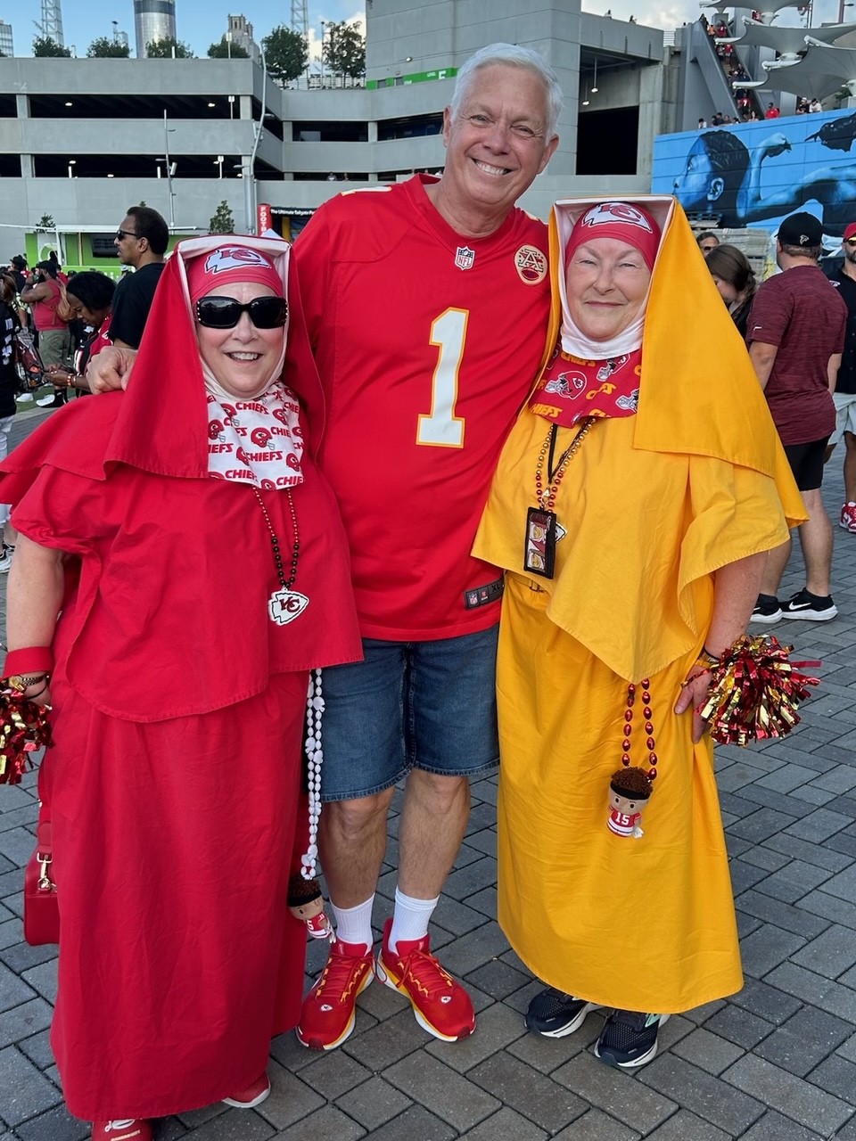 SUPER FANS - Roger Cooper (center) with a couple of fellow Kansas City Chiefs super fans he ran into a Atlanta. Cooper said he has seen the “nuns” at Kansas City as well, and the two ladies have become fan celebrities.