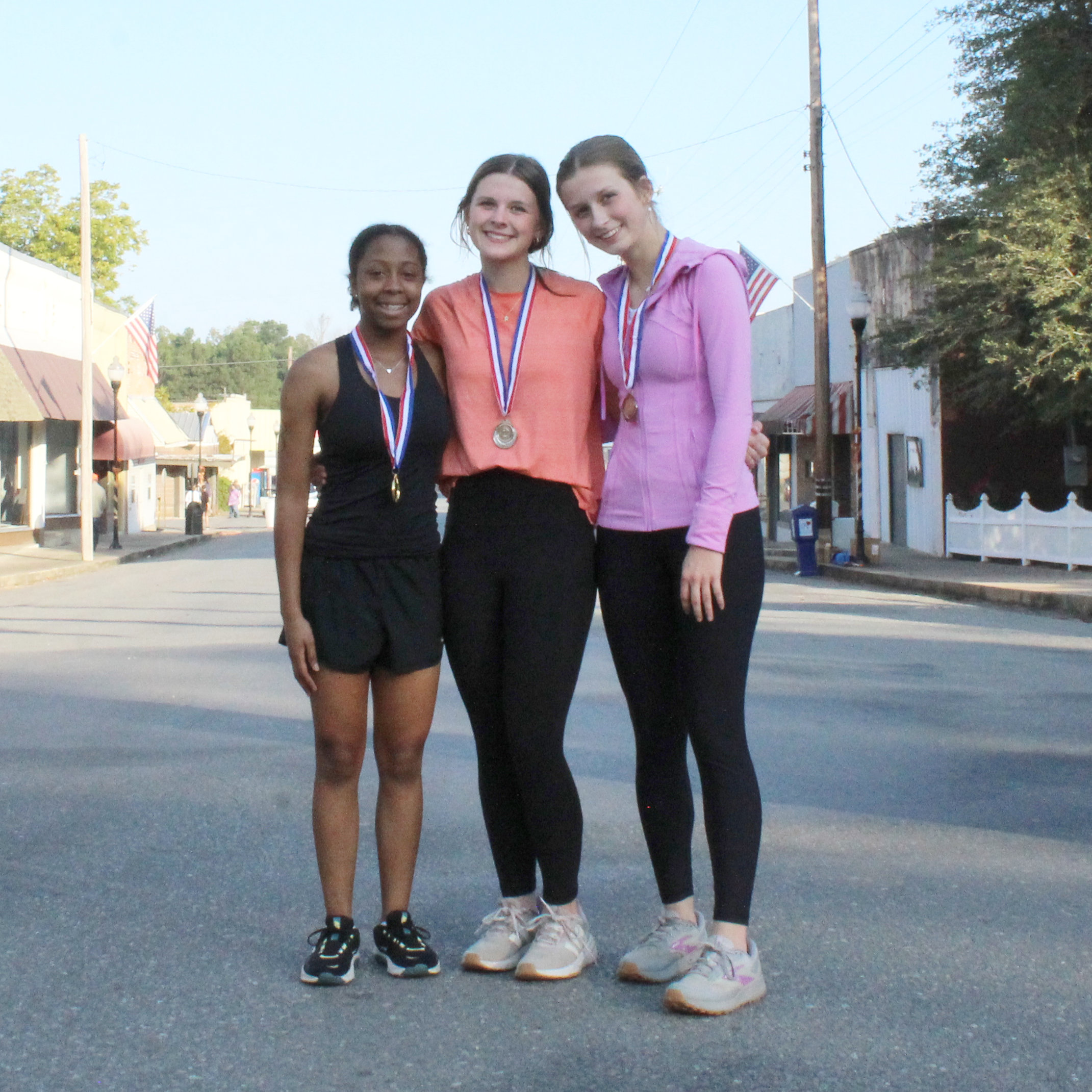 In the women’s division of the Race to Rison in the Fall 5K  the top three finishers were (left to right) first place, Kayka Jackson, 25:46; Riley Hyatt, 26:14; and Haven Simpson, 30:04.