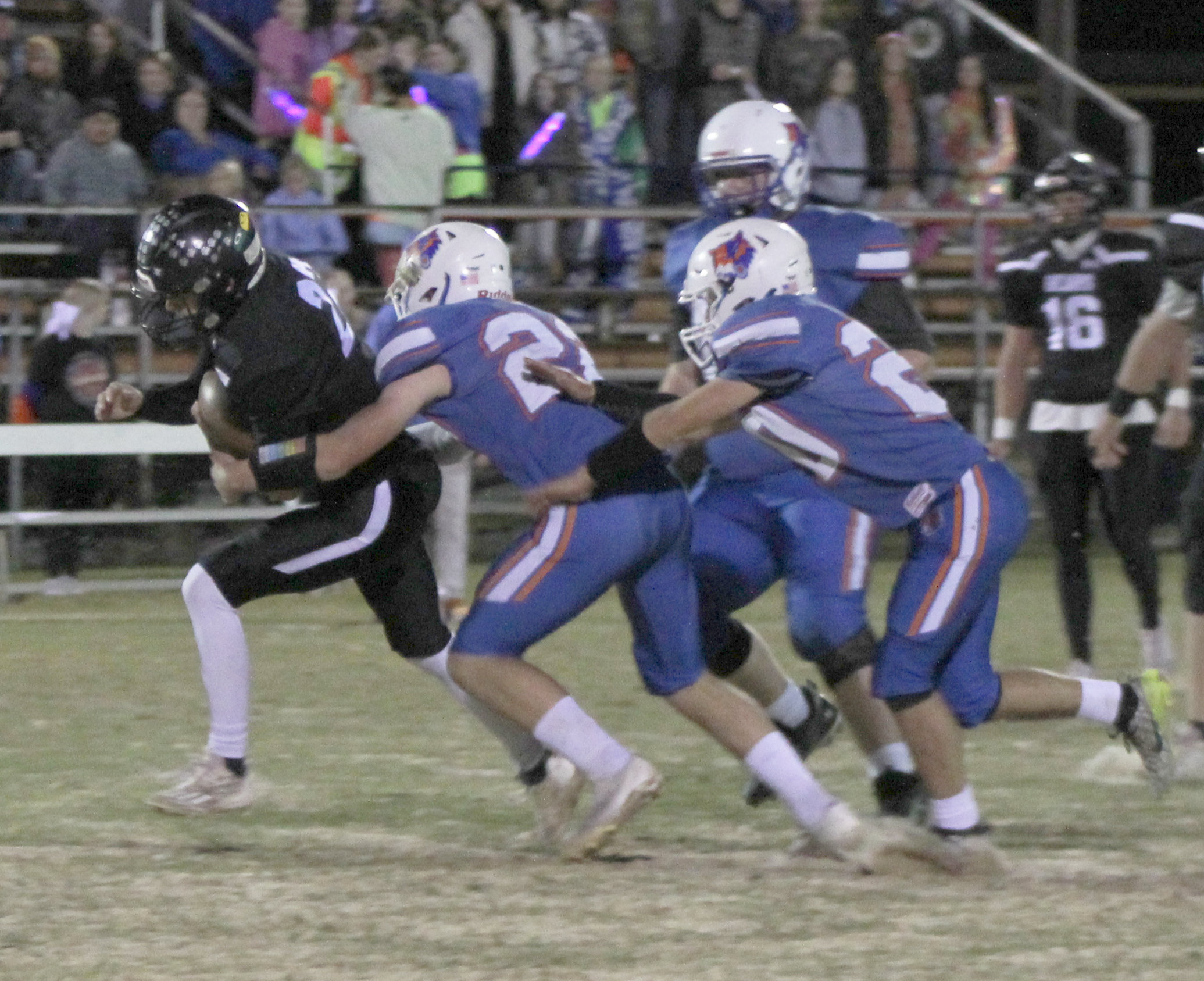 GRINDING IT OUT - Woodlawn’s Ethan Adair tries to elude the tackle fo Cedar Ridge’s Bentley Bullington during first half action of the Bears’ first-round playoff game at Cedar Ridge. The Bears outgained the Timberwolves on the ground, 219 yards to 75 yards, but Cedar Ridge was able to hit some big passes late in the game to pull out the win. Adair would later return a kickoff 57 yards for touchdown to tie the game, 44-44, with 1:51 left.