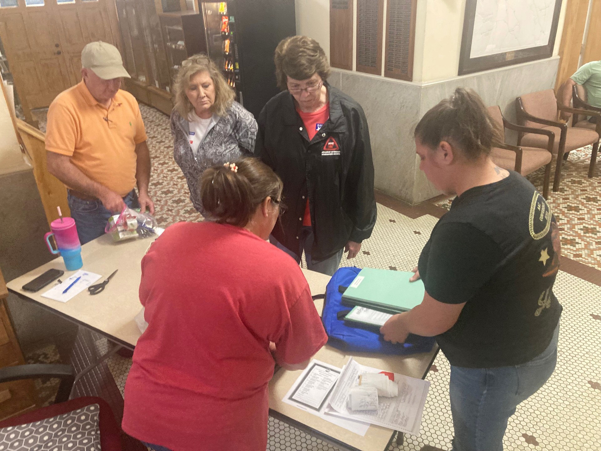 FIRST RETURNS - Cleveland County Election Coordinator Billy Bowlin (left) and Cleveland County Clerk Brandy Herring (right) check in the first returns presented at the Cleveland County Courthouse from Tuesday’s general election. Bowlin reported that the election went relatively smooth Tuesday with no technical issues reported from any of the polling sites across the county.