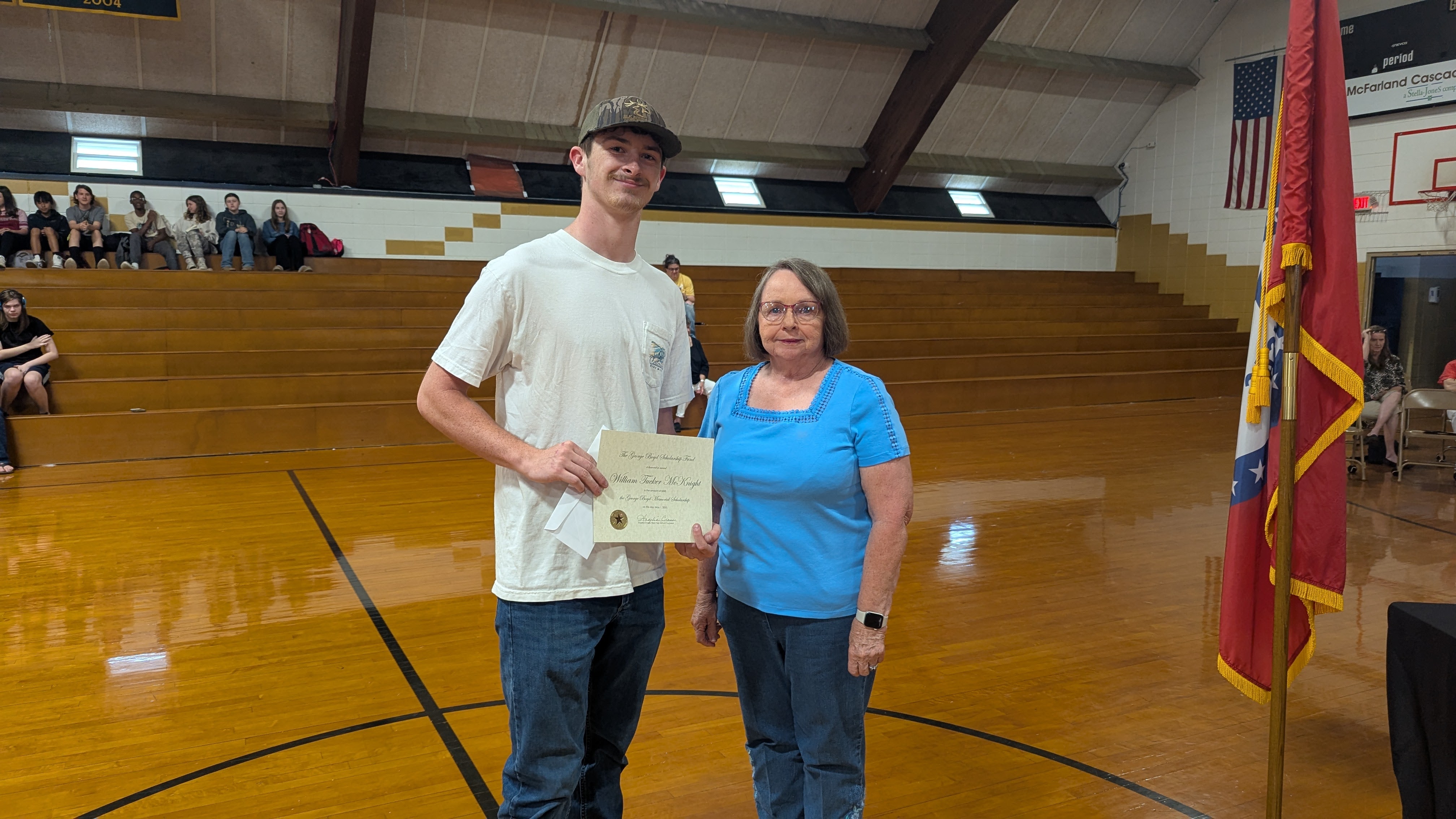 Pat Boyd presents the George Boyd Memorial Scholarship to Tucker McKnight