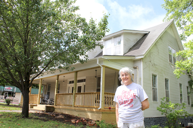 GIVING BACK TO RISON - Malinda Berry stands outside the Emerson house in downtown Rison before the launch of her new florist business, My Berry Patch, five years ago. Berry said she found a much different Rison when she returned to her hometown after growing up in Arizona.