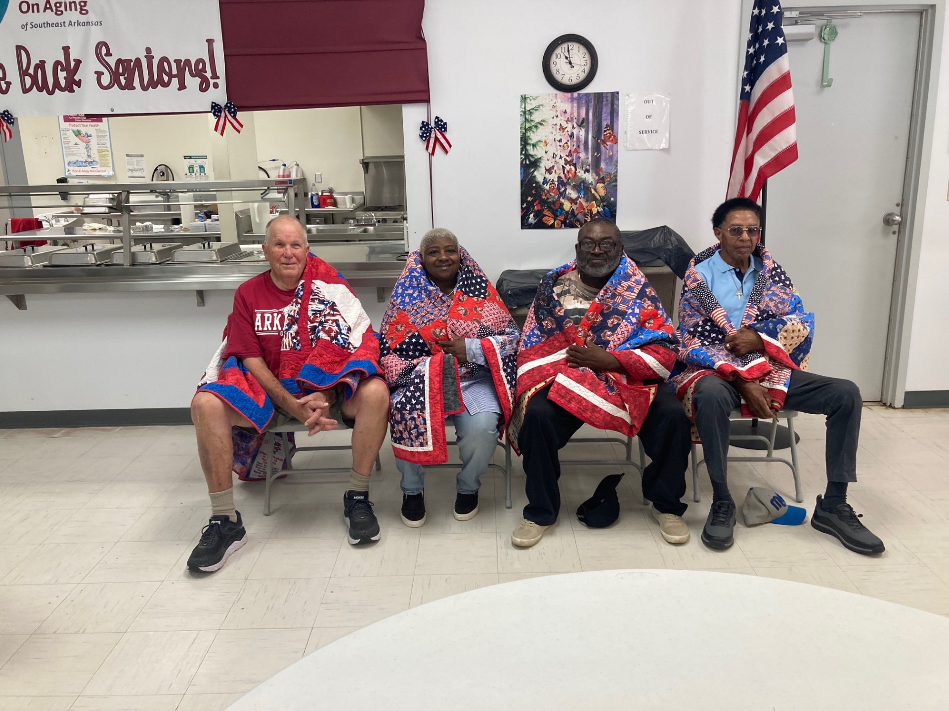 QUILTS OF VALOR - Four veterans from the Rison area were presented Quilts of Valor during a ceremony Tuesday morning at the Cleveland County Senior Citizens Center. Those receiving the quilts were (left to right ) William Threlkeld, Nadine Young, Thomas Young and John Young. Another veteran scheduled to receive a quilt, Mark Young, was unable to attend.