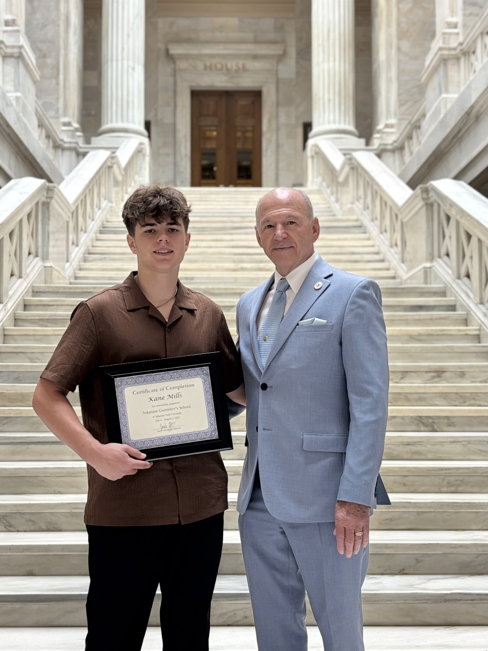 Kane Mills with State Representative Mike Holcomb