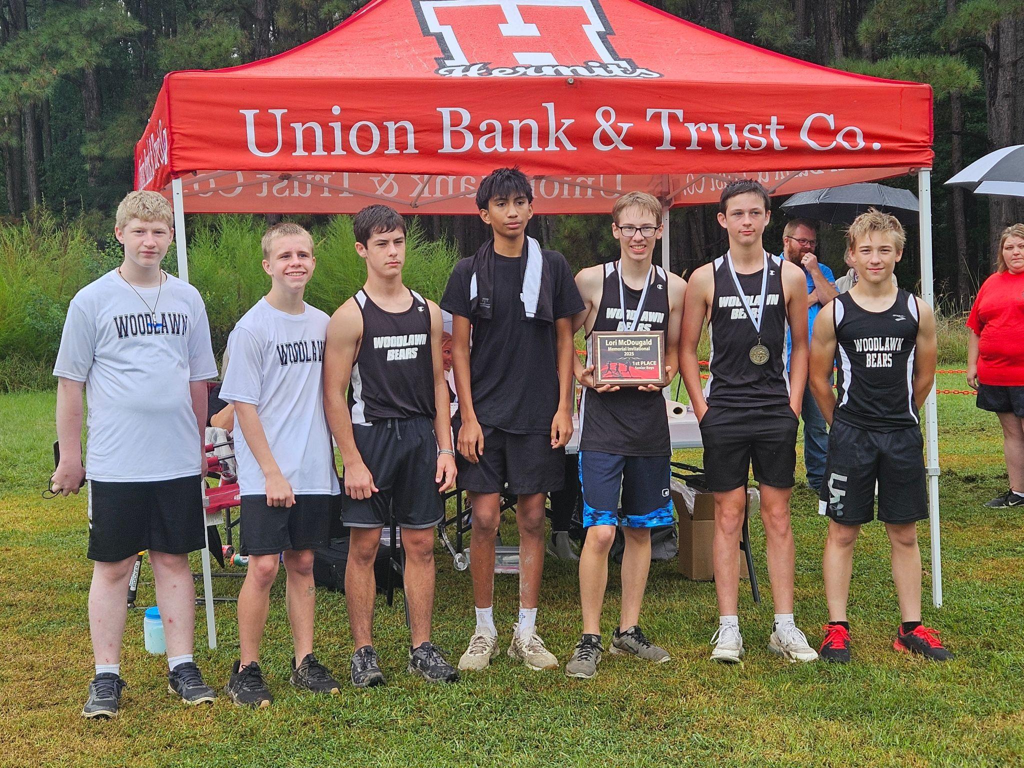 WOODLAWN BEARS WIN MEET - All five runners for the Woodlawn Bears boys cross country team recently finished in the top 20 at the Lori McDougald Memorial Invitational meet held at Moro Bay to win their division, Coach Autumn Lem reported. Picutred (left to right) are Danny Watkins, Dakota Sullivan, Tucker Hoyt, Cliserio Dominguez, Isaac Lowe (3rd place overall), Brayden Jones (4th place overall) and Justus Lowe.