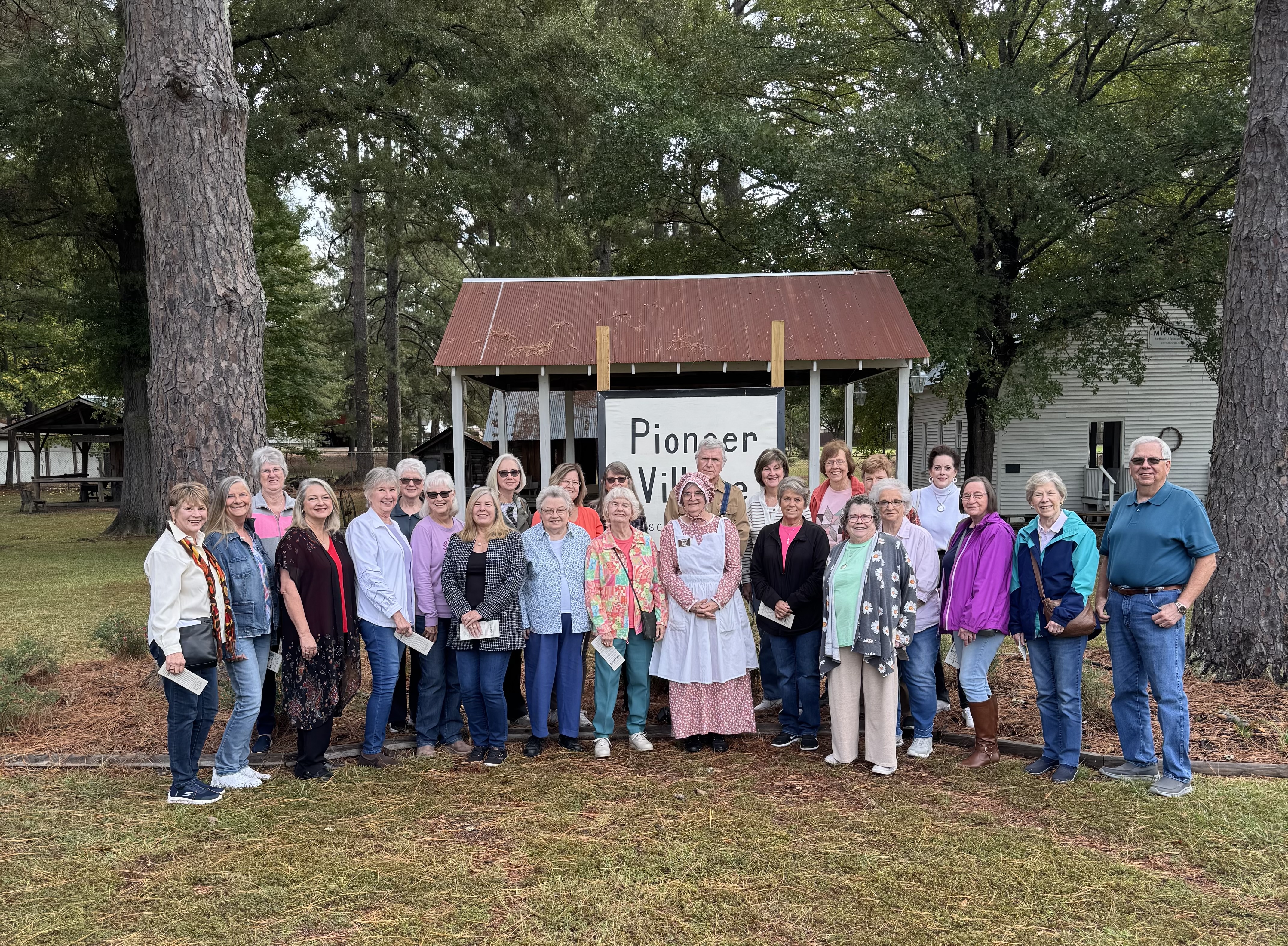 Pictured with the group is the Pioneer Village’s own Shorty and Luther Drye.