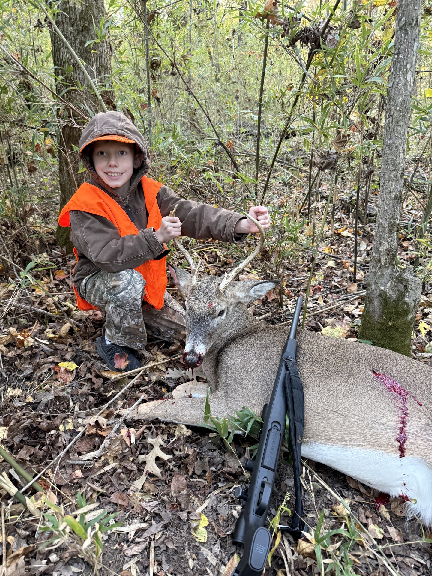 FIRST DEER - Jackson Neal, 8 years old, killed his first deer, a 6-point, in Kingsland. 