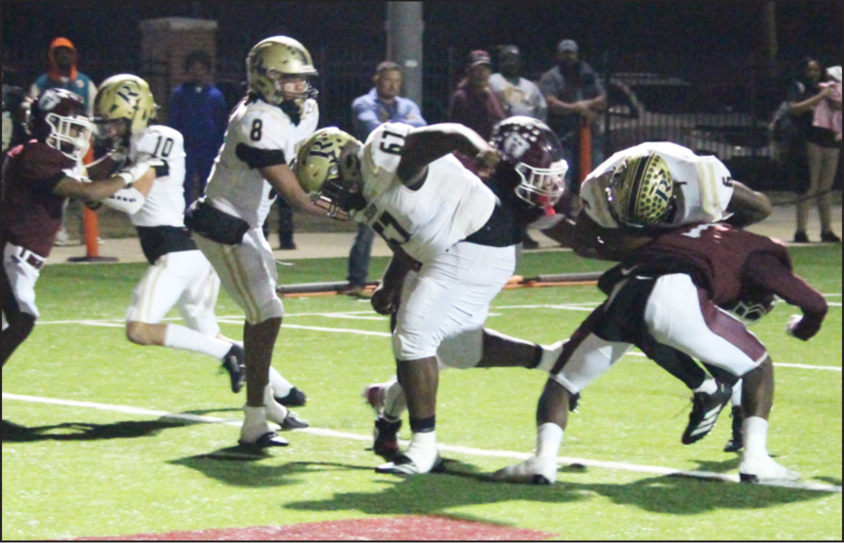 PUNCHING THROUGH - Rison running back Jaquis Rauls (right, 6) follows the block of T.J. Marks (67) to cross over the goal line and help put the Wildcats back on top of the Barton Bears, 22-20, in second quarter on Friday night’s season finale at Barton. Rauls, a senior, rushed for 68 yards and scored two touchdowns in what was his final football game for Rison. Also pictured for the Wildczts are Henry Garner (10) and Kyson Fletcher (8). (Photo by Chris Phillips)