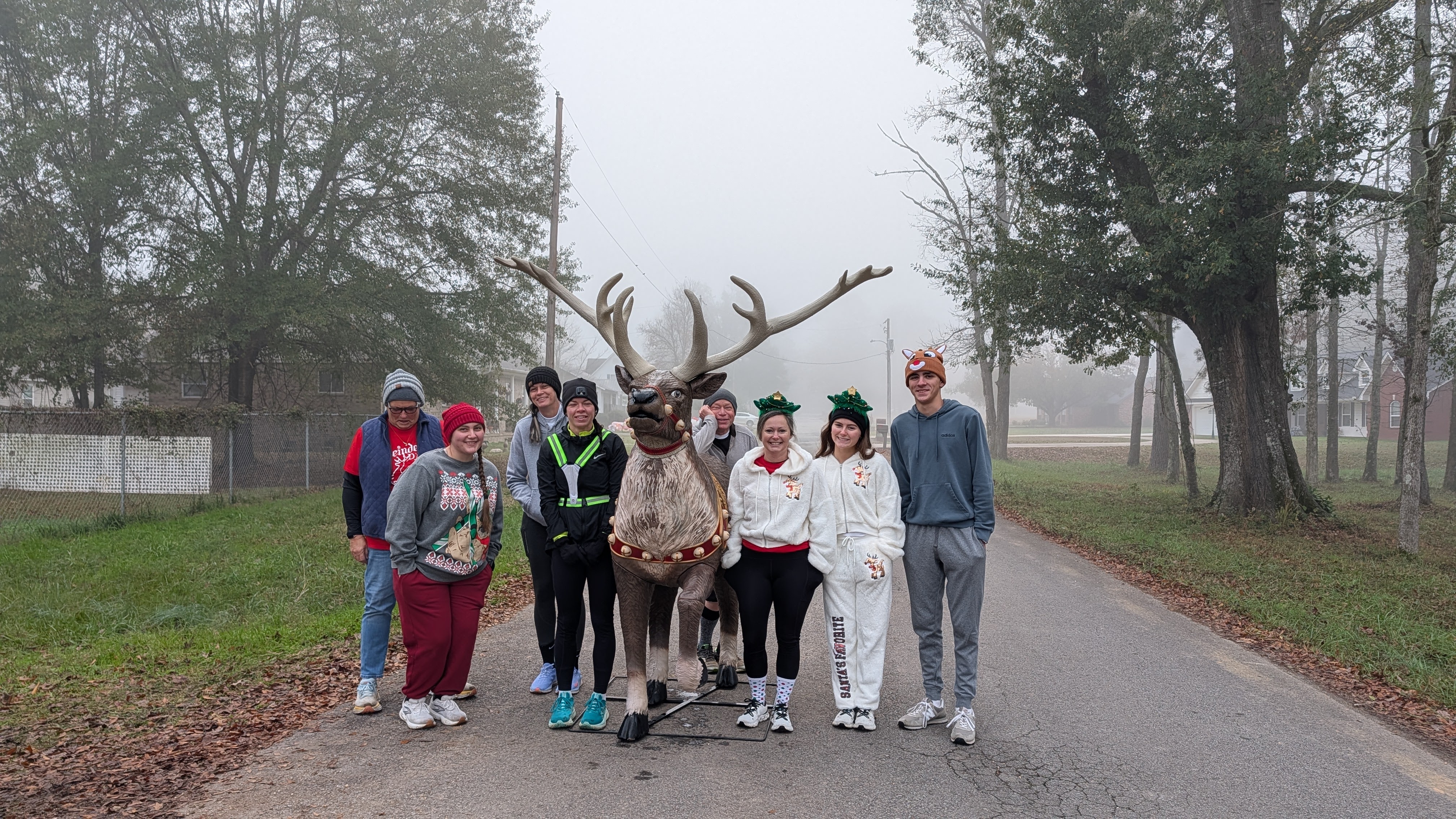 REINDEER RUN 5K - The Pioneer Village hosted the Reindeer Run 5K Saturday, Dec. 6. Pictured are Village President Marty Bowlin with runners Alyssa Parker, Kristie Saunders, Lauren Threlkeld, David West, Alicia Woody, Alivia Nixon, Jack Menard.