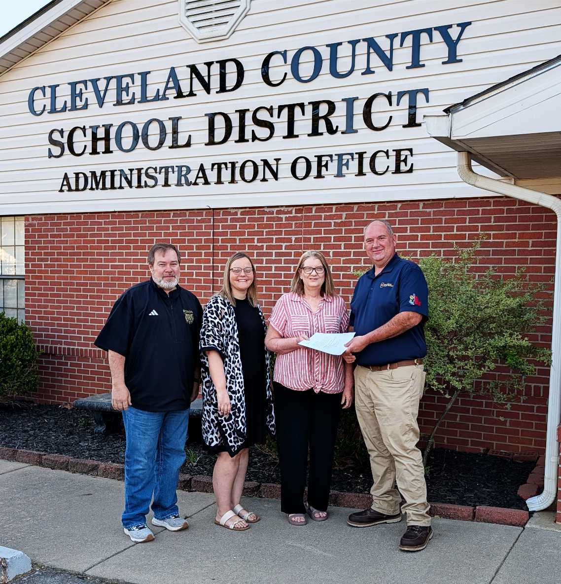 HEAD START RECEIVES DONATION OF LAND FROM INTERNATIONAL POULTRY - Cleveland County School District’s Head Start program received a donation of a 0.87-acre lot from International Poultry Breeders. Pictured left to right are CCSD Superintendent Davy King, Head Start Director Laura Stanfield, Head Start Facilities/Nutrition and Safety/Transportation Manager Connie Keese, and IPB Arkansas General Manager Jamie Phillips.