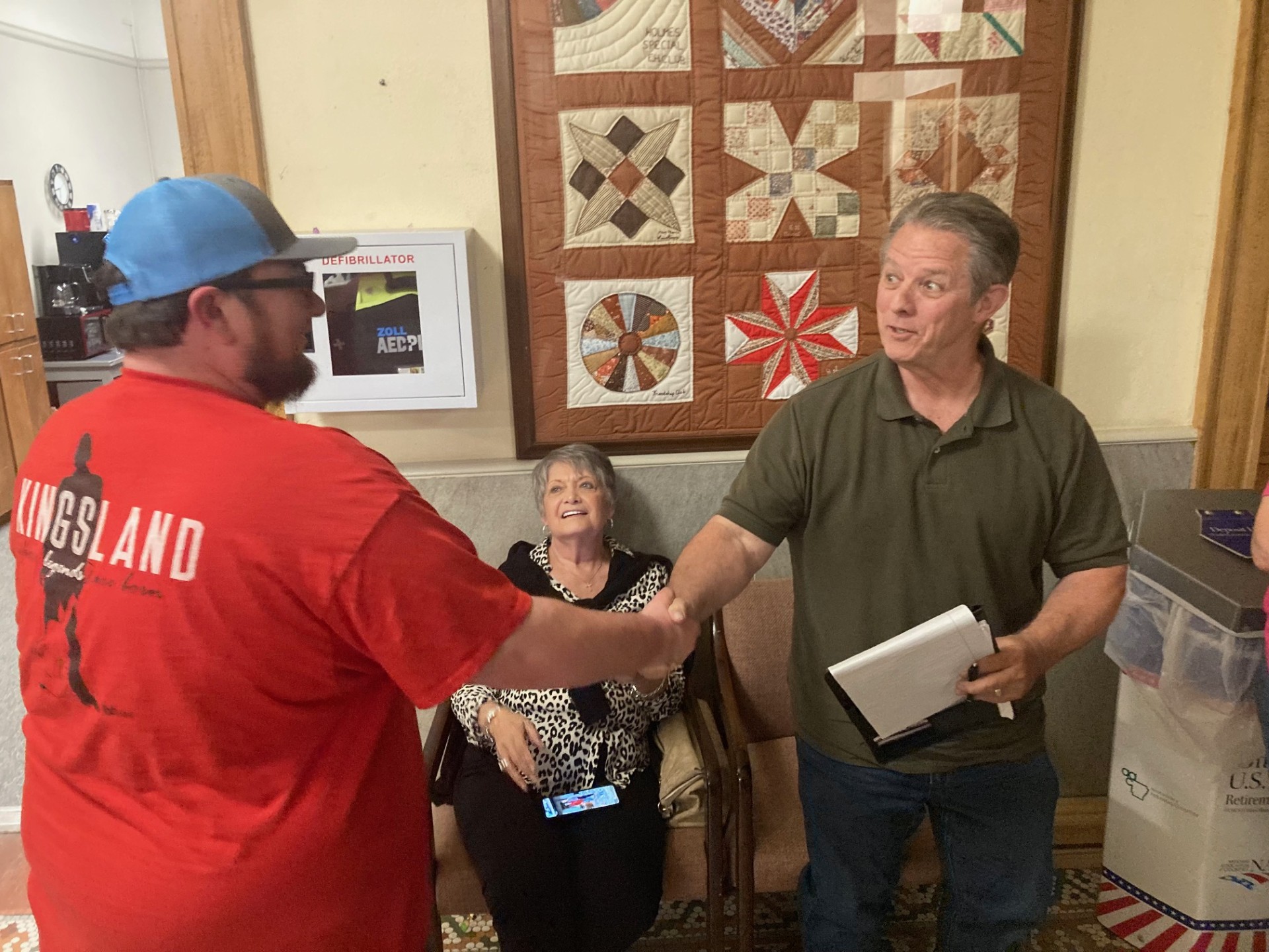 McCLELLAN CONGRATULATES HOUSTON - Cleveland County Judge candidate Stephen McClellan of New Edinburg (left) congratulates runoff election winner Jim Houston of Rye (right) in the Cleveland County Courthouse after the final ballot box came in after Tuesday’s Republican primary runoff election.