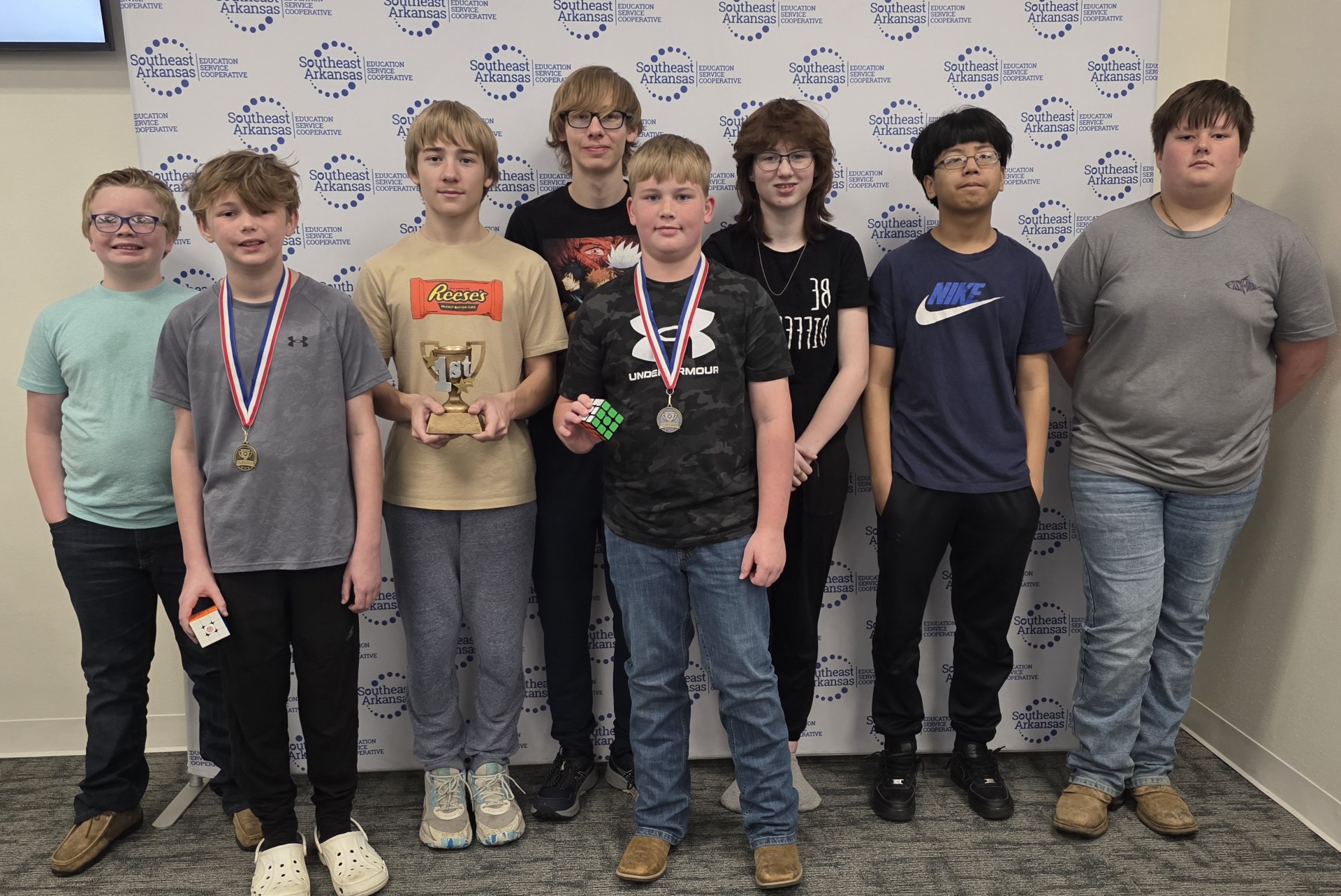 Pictured are (left to right) Jackson Bearden, Jack Harris, Justus Lowe, Isaac Lowe, Brantley Reed, Shelby Nooner, Victor Hu, and River Barrett. (Photo courtesy of Misty Davis, Woodlawn School District)