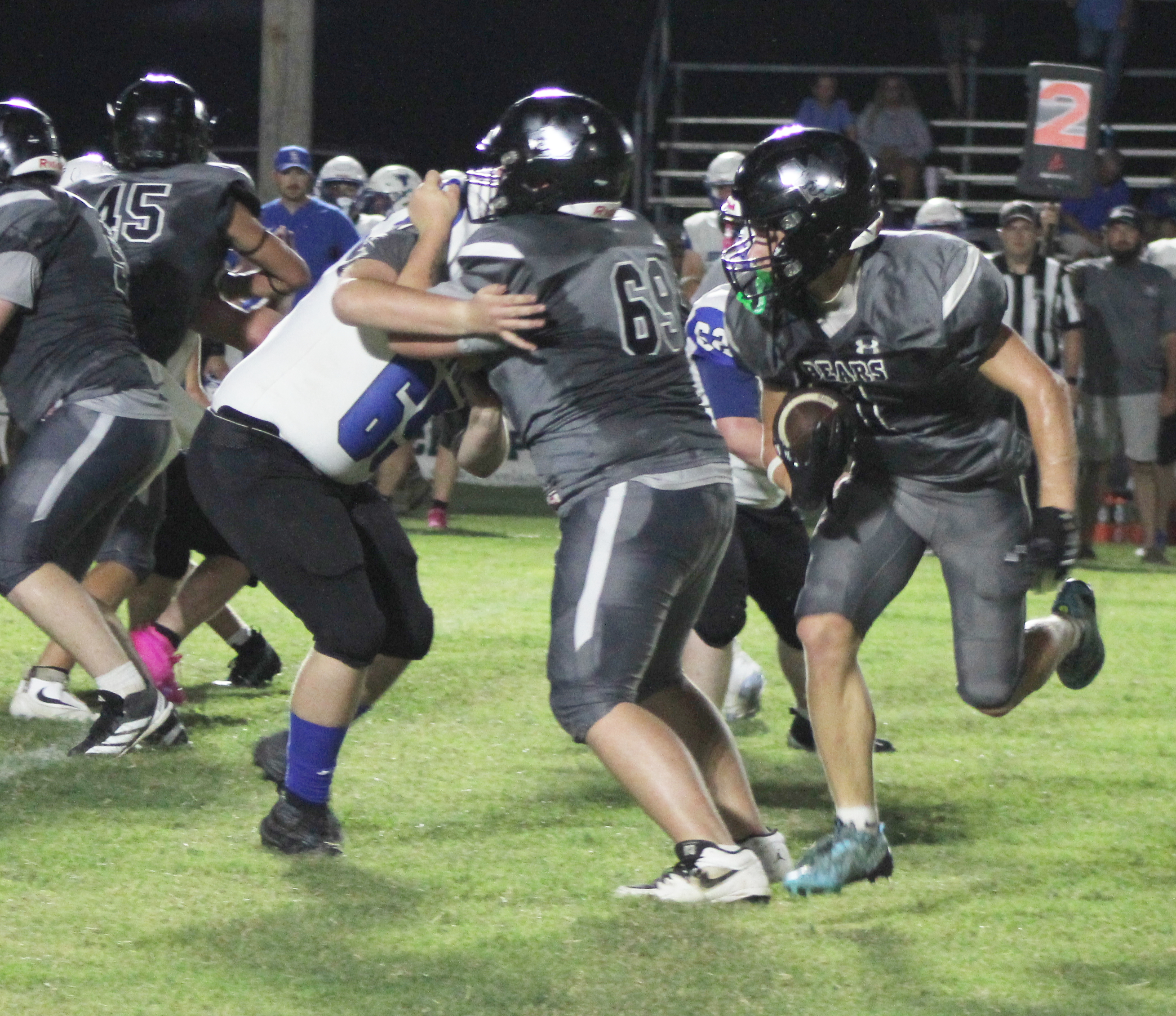 BIG OPENER FOR MANES - Woodlawn junior running back Griffin Manes (right) follows the block of Ashton Edwards (left) for more positive yardage against the South Side-Bee Branch Hornets. Manes, who was an All-State selection as a sophomore, put up 247 yards rushing on 15 carries with two touchdowns. He also caught a 43-yard touchdown pass.