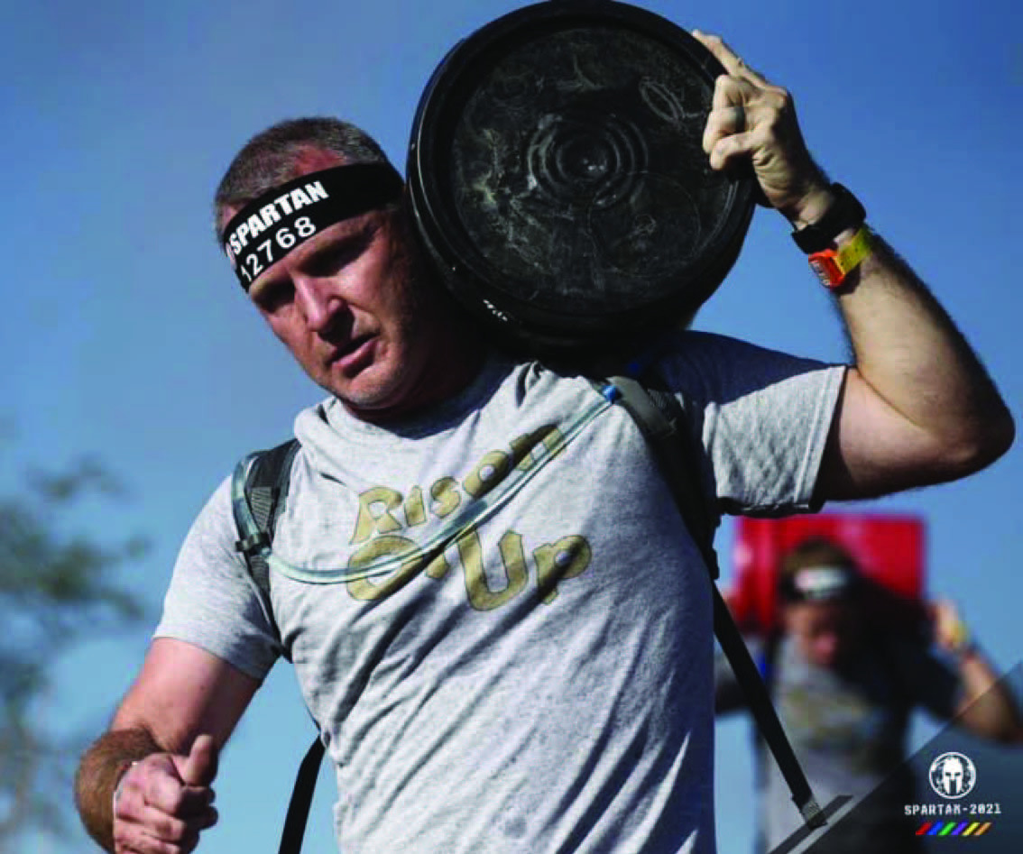 RISON'S OWN SPARTAN CATCHES THE FEVER - Rison's Les Walz, pictured here competing in a Spartan Race in 2021, sits down for this week's episode of the Herald's Free Range Conversations podcast. He shares stories of his time as Cleveland County's extension agent, growing up in Germany, and how he caught the competitive exercise fever.
