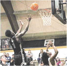 LAWSON MAKES ALL STATE TOURNAMENT TEAM - Woodlawn's Raylon Lawson (no. 1), seen in this file photo playing against Rison, earned All State Tournament Team honors after scoring 23 points in the Bears' 6052 loss the Lavaca Golden Arrows in the first round of the Class 2A State Tourmament last week at Mansfield High School. Woodlawn cut a 17-point halftime deficit down to four with 2 minutes left before Lavaca was able to turn back the rally.