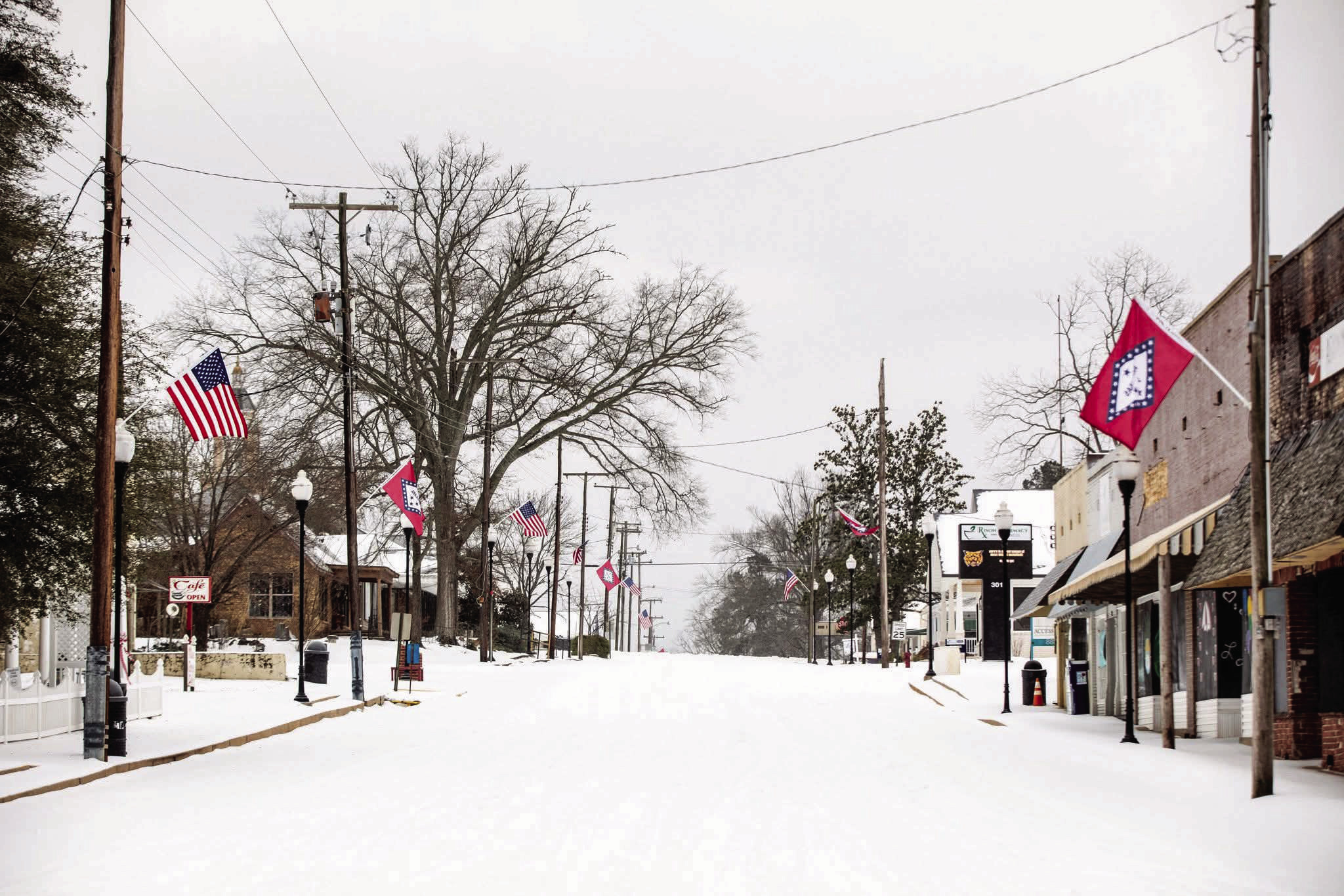 QUIET ON MAIN STREET - Main Street in Downtown Rison was a picture-perfect scene Saturday under blankets of ice and snow from the weekend's winter storm. (Photo courtesy of Michelle Roberts Photography)
