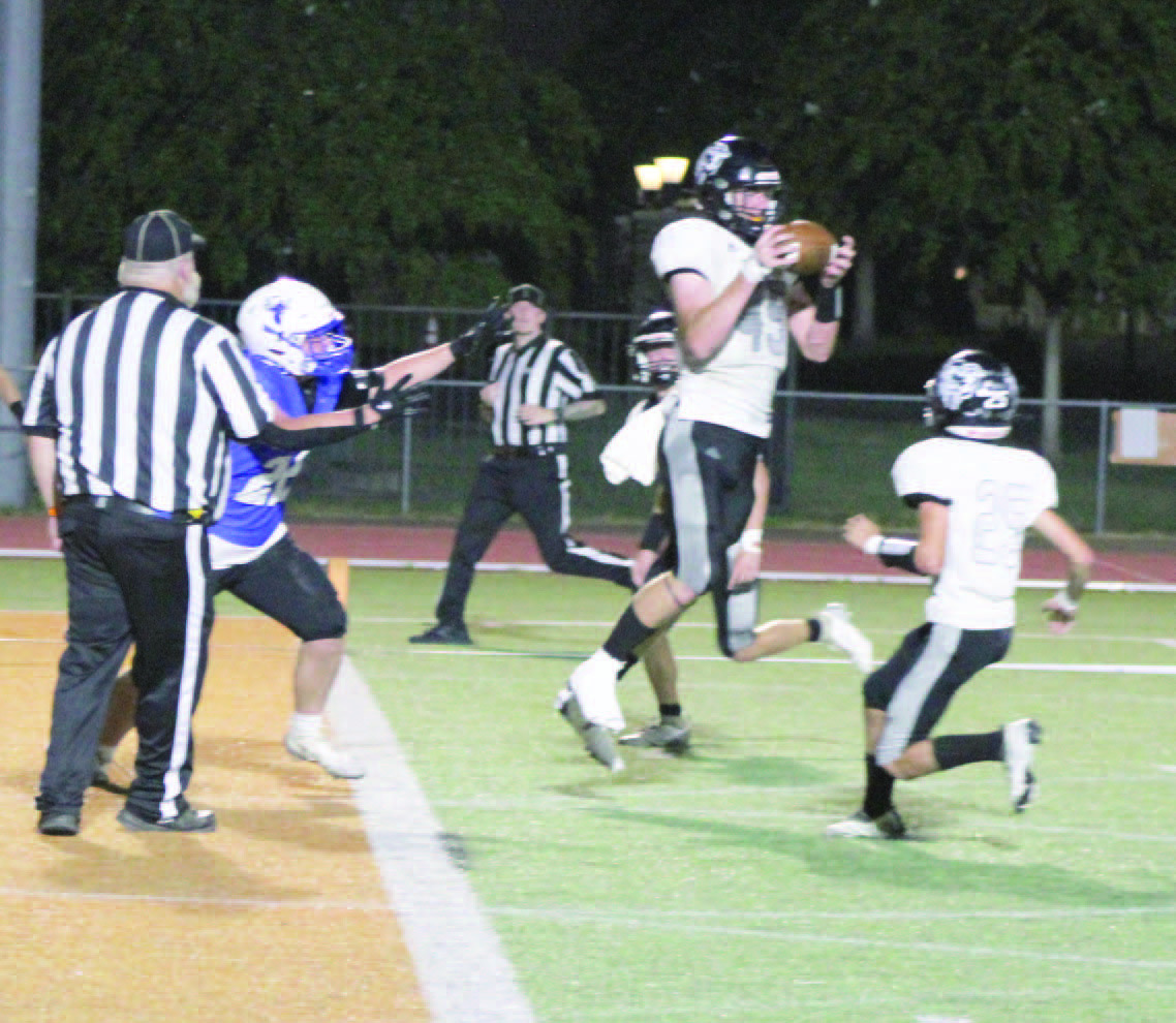 PICK SIX - Woodlawn's Beau Watson (center, 45) picks off a South Side pass at the Bears' 1 yard line before returning it 99 yards for a touchdown on the second play of the second quarter. The Hornets were driving to make it a one-score game, but instead Watson's return gave Woodlawn a threescore advantage. Also pictured for the Bears is Brayden Jones (25).