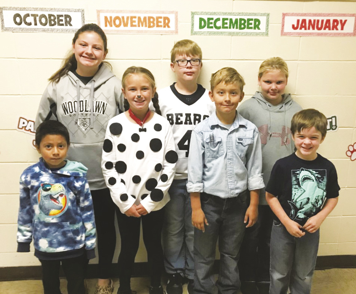 OCTOBER ‘PAW’SITIVE STUDENTS OF THE MONTH - These Woodlawn Elementary students exhibited “honor,” which was the October ‘Paw’sitive Word of the Month. Pictured are: (front row) First Grader Manuel Rivera-Valdovinos, Fourth Grader Ella Richardson, Second Grader Lane Stanfield, Kindergartener Garrett Phillips; (back row) Sixth Grader Paisley Scharf, Fifth Grader Bentley Parker, and Third Grader Addison Kennedy.
