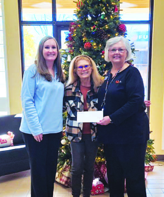 Amber Hipp and Penny Pitchford at FBT Bank with Karen Bell Fox