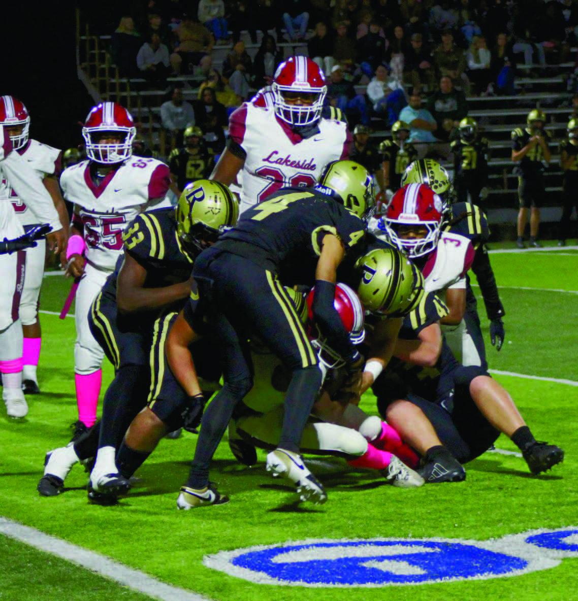 STOPPING CONIC - While Lake Village quarterback Roderick Conic, Jr. scorched Rison for 145 yards rushing and three touchdowns in the first half, the Wildcat defense did a better job of containing him over the final two quarters as he netted just 30 yards. Here, (left to right) Ladarre Eppenger, Dedrick Wells, Braylin Bennett, Tanner Collins and Bryce Phillips corral the elusive Conic on a fourth-down stop in the third quarter.