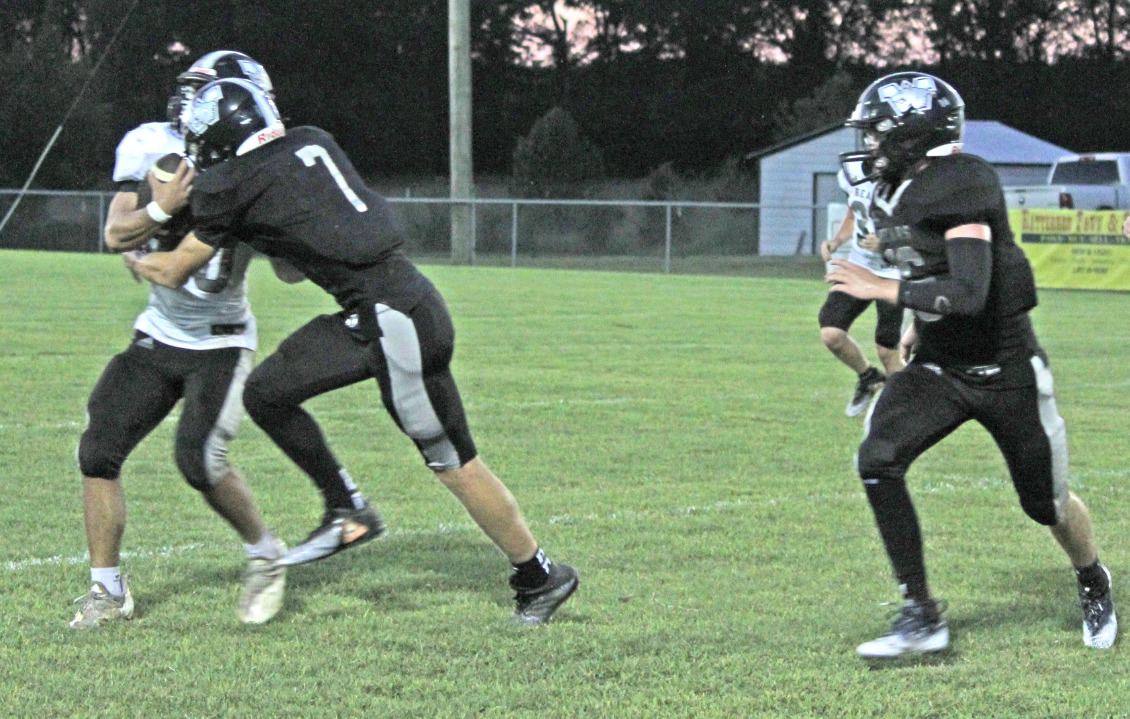 White Rallies Past Black With Late TD