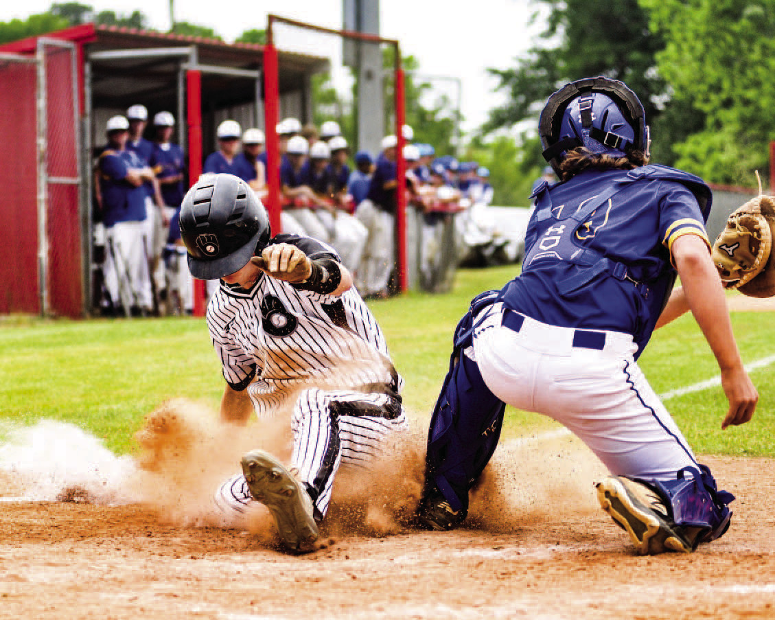 SAFE AT HOME - Woodlawn's Mason Edmonds, running for Austin Howard, slides safely into home plate in the bottom of the sixth to give the Bears a 6-5 lead over Spring Hill in the opening round of the Class 2A South Region Tournament at Horatio. Woodlawn added three more runs to poast a 9-5 victory. (Photo by Kelvin Scott, Cardboard Sports)