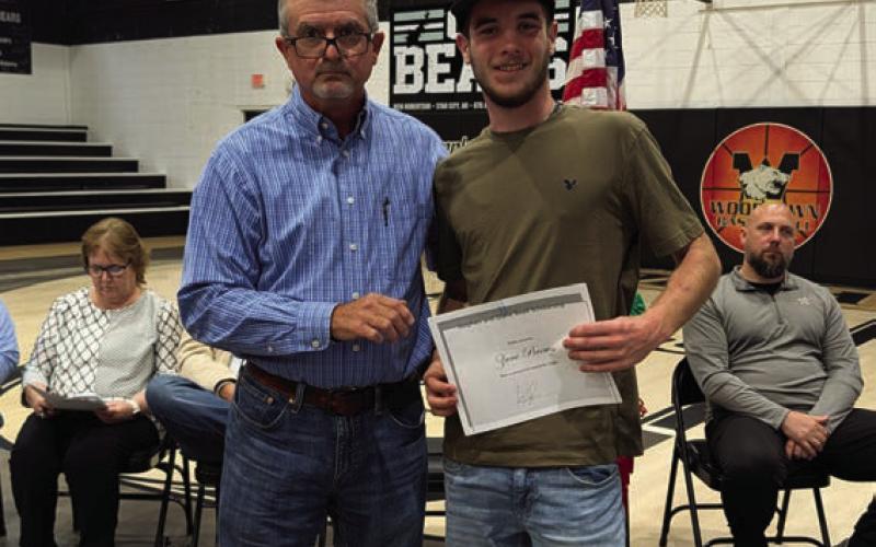Stephen Boyd presents the Stephen and Diane Boyd Scholarship to Zane Brown