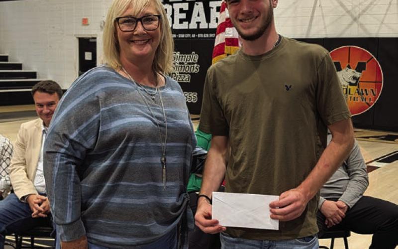 Tonya Williams presents the Danny Jacks Memorial Scholarship to Zane Brown
