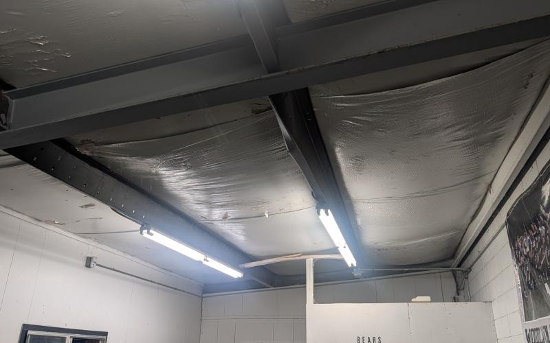 WINTER STORM DAMAGE - Superintendent Dr. Kevin Hancock informed the Woodlawn School Board Monday night that the campus suffered some damage from the recent winter storm that dumped about 3 inches of sleet on the county. Staff found two metal purlins supporting the roof inside the field house twisted from the weight of the ice. He said there was also damage to some of the lights at the baseball field as well as some air conditioning units being dented by ice falling off buildings.