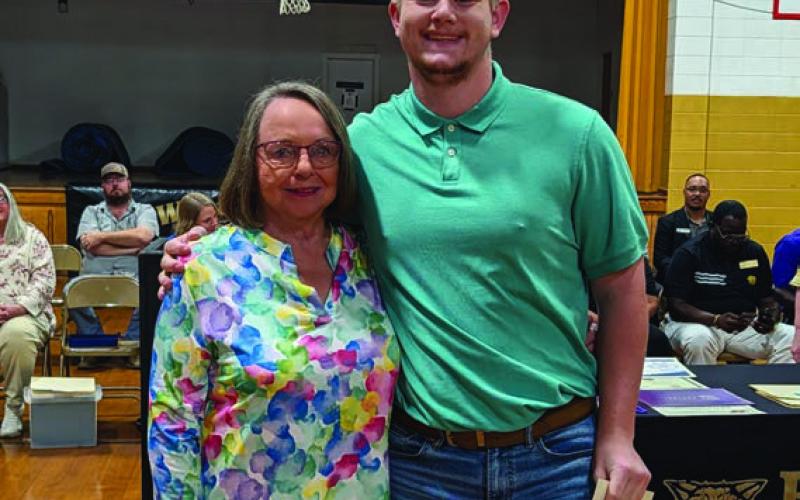 Pat Boyd presents the George Boyd Memorial Scholarship to Bryce Phillips