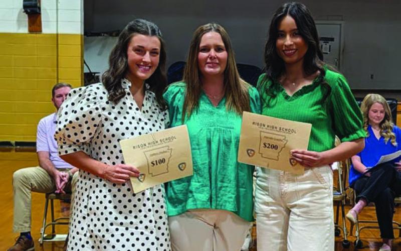 Kim King presents FBLA Scholarships to Mallory Stuckey and Marcela Castillo