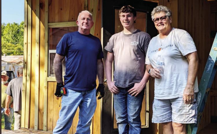 PROGRESS ON PIONEER VILLAGE JAIL - Construction has continued on the new jail at the Pioneer Village in Rison. Village President Marty Bowlin (right) wished to thank Landon Inman (center) for his contributions to the jail. Also pictured is Billy Bowlin (left).
