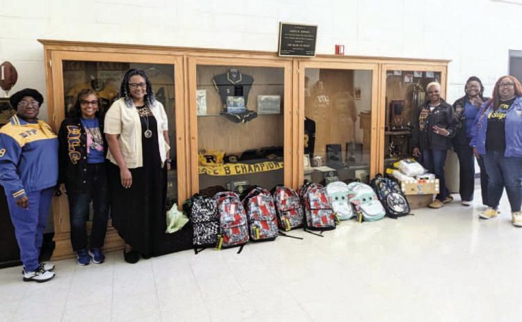 Pictured left to right are Mary Harvey-Evans, Rosie Pettigrew, Rison High School Principal Letitia Walker, Janice Williams, Angelee Word and Rachel M. Will.