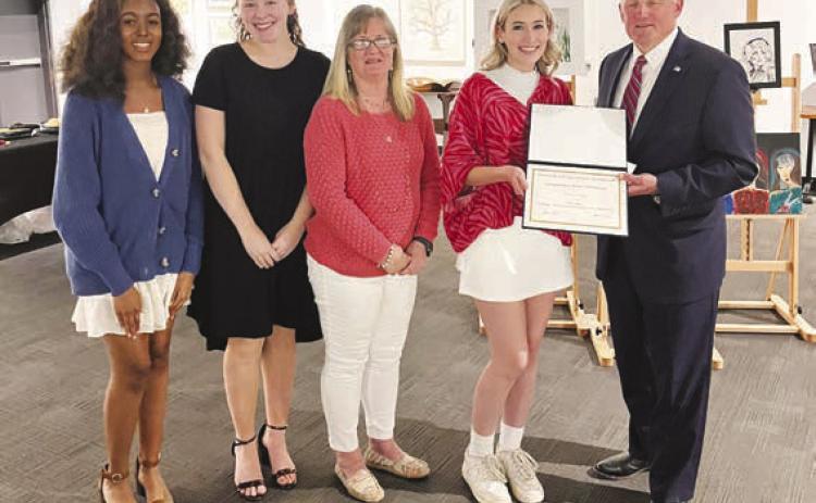 Pictured are Anna Scott, Keeli Stewart, Art Teacher Nickie Owens, Aubree Wright, and Congressman Bruce Westerman.