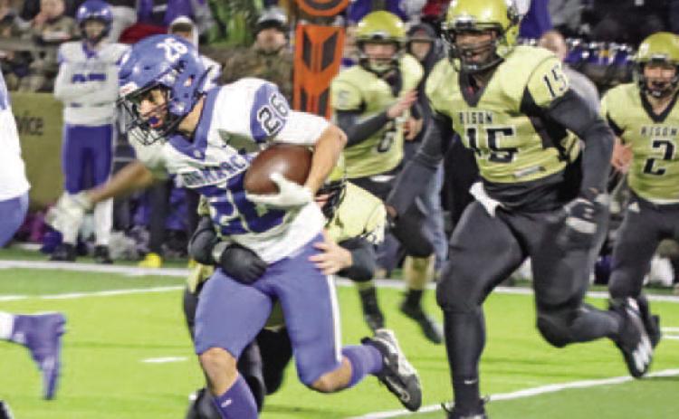 YARDLEY ON THE STOP - Rison's Dolten Yardley brings down Bismarck's running back Johnny Diaz during first quarter action. Yardley was one of the Wildcats' leading tackles and also had a fumble recovery near the end of the third quarter that allowed Rison to go up by two scores, 24-12, in the final period. (Photo by Chris Phillips)