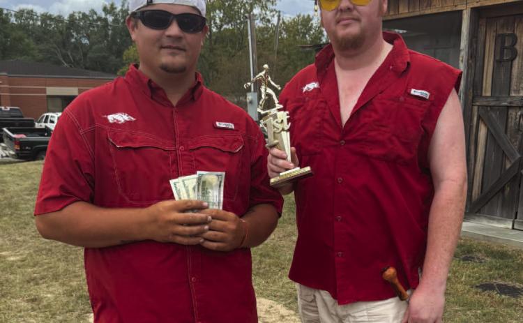 TROPHY WINNER - Walter Steitler and Mark Addison won first place in the Joe Cook Memorial Horseshoe Tournament held during Saturday's Rison in the Fall Festival.