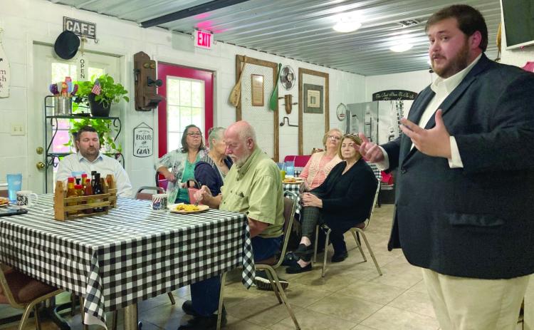 GILMORE HOLDS BREAKFAST MEETING IN RISON - Current District 26 and future District 1 State Senator Ben Gilmore of Crossett (right) speaks to about two dozen people gathered for a breakfast meeting at the Main Street Cafe in Rison last Wednesday morning. While Gilmore currently represents the eastern half of Cleveland County as the District 26 state senator, he will represent the entire county as the District 1 state senator beginning Jan. 1.