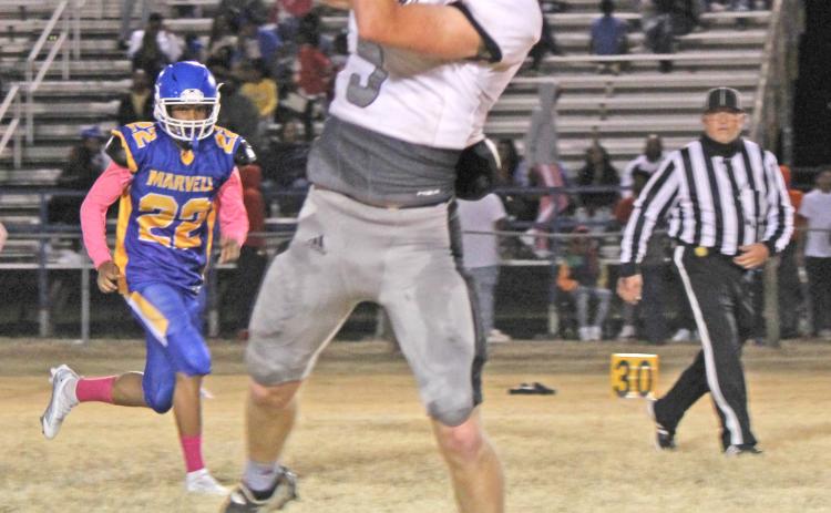 AIR BEARS - Woodlawn’s Payton Leveritt pulls down an 18-yard pass from Jaxson Martin during second quarter action Friday night at Marvell. The Bears, who usually rely on their run game, saw some success through the air against the Mustangs as Martin completed 7-of-10 pass attempts for 121 yards.