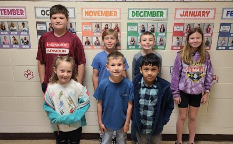 WOODLAWN ELEMENTARY STUDENTS OF THE MONTH - These students exhibited “Excellence,” which was the March ‘Paw’sitive word of the month. Pictured are Back Row: Logan Doss (6th grade), Eli White (5th grade), Carson Fothergill (3rd grade), Ella Burris (4th grade); Front Row: Heidi Long (Kindergarten), Remington VanDuren (1st grade), Giovanny Ruiz (2nd grade).